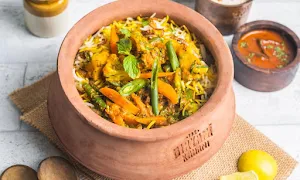 The Biryani Kahani Proudly 100% Vegetarian - Logo
