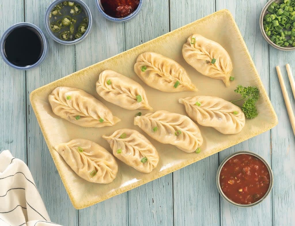 The Boss Of Momos - Logo