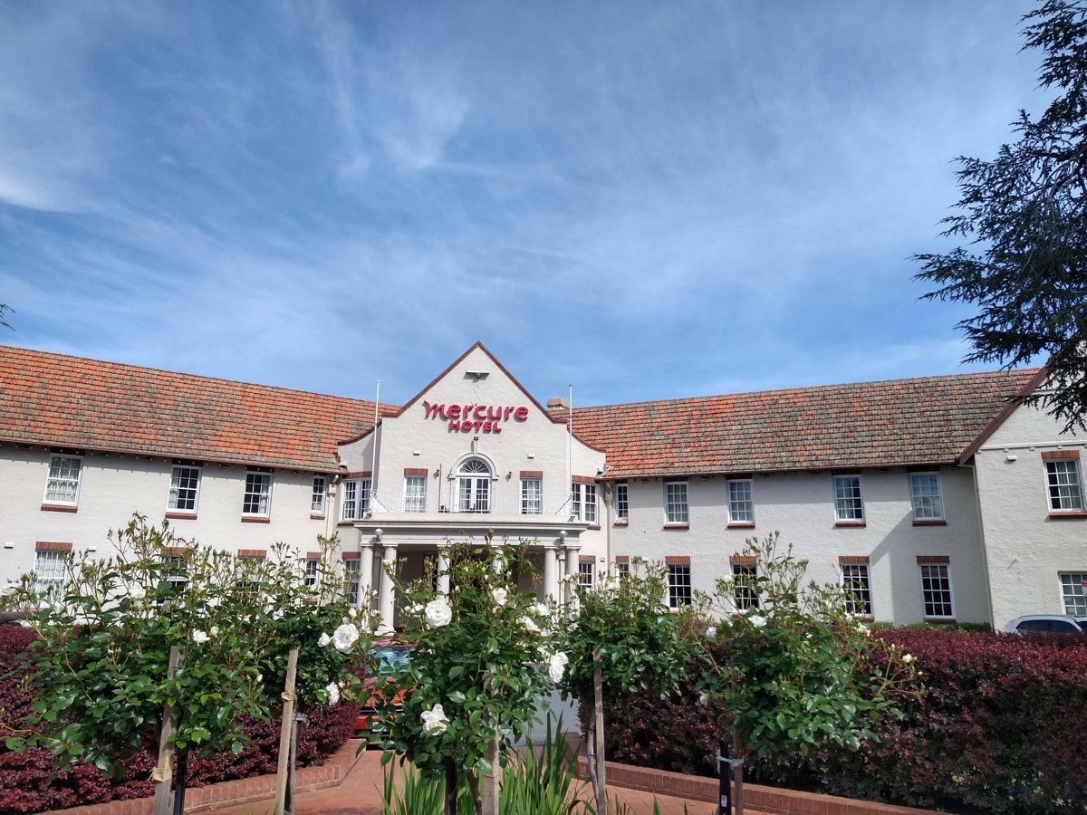 The Courtyard Restaurant @ Mercure Canberra - Logo