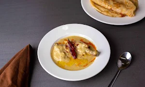 The Cuisine Story - Logo