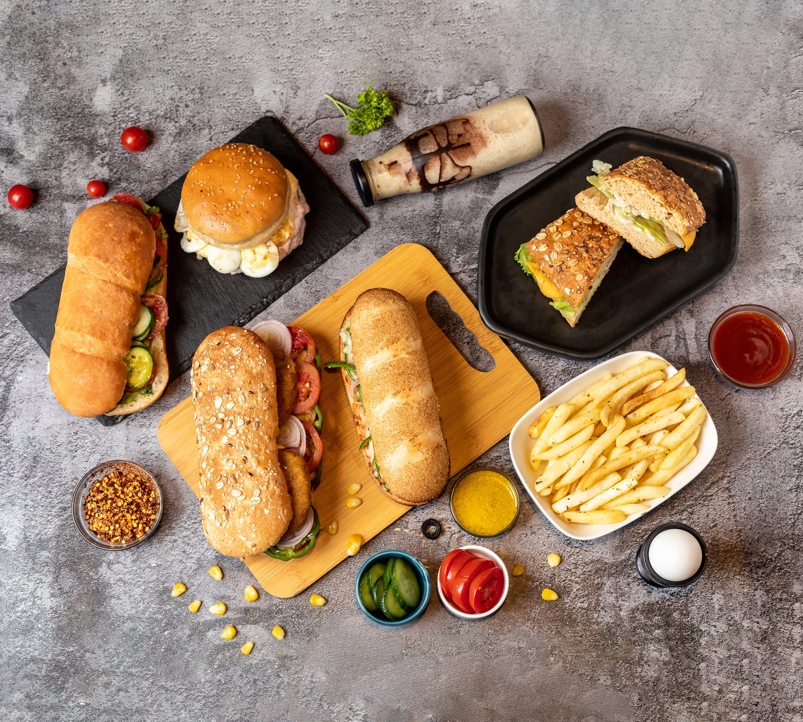 The Gourmet Deli- Subs, Sandwiches, Salads & More - Logo