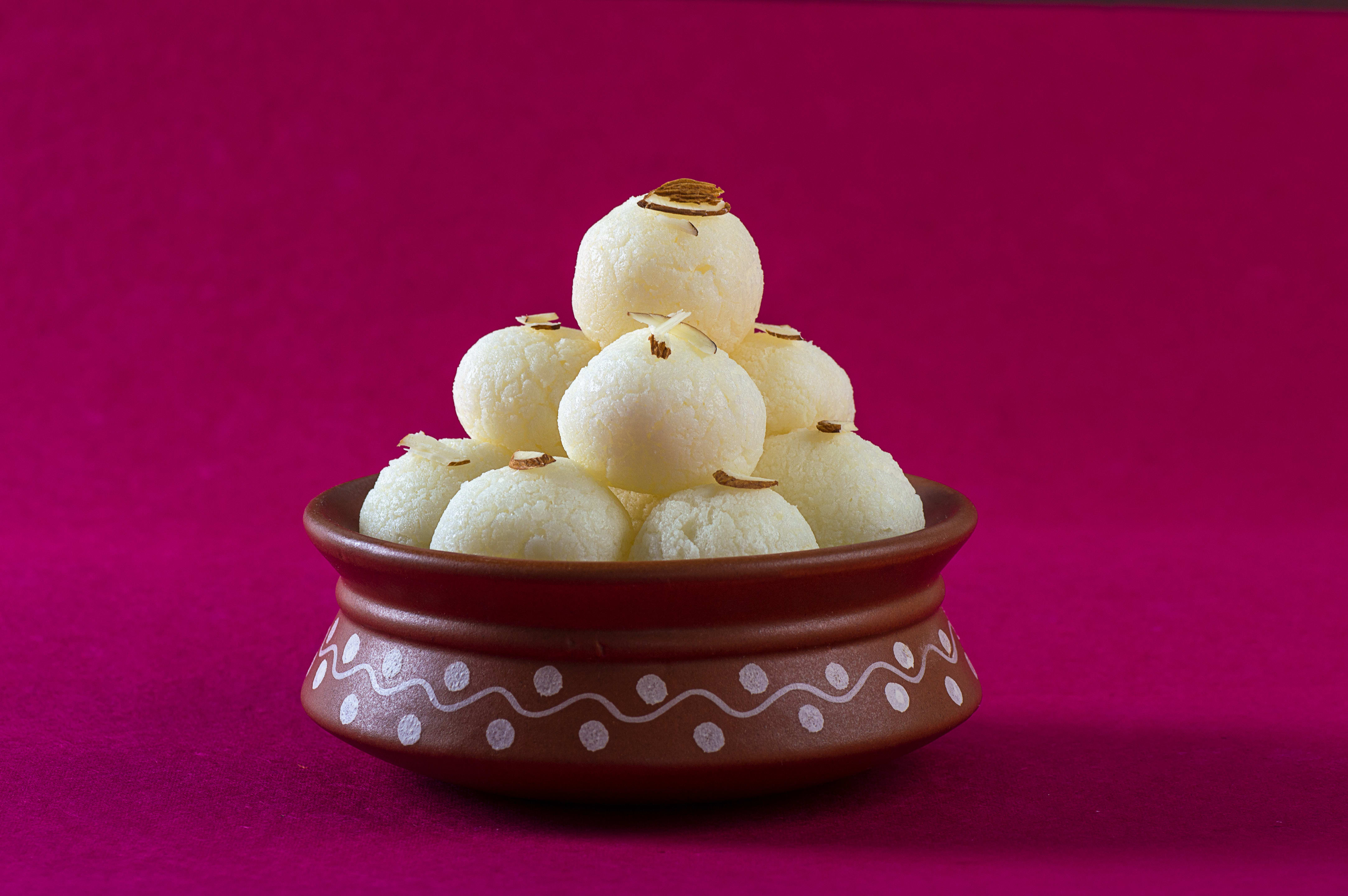 The Grand Sweets and Snacks - Amirtham Restaurant - Logo