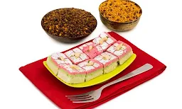 The Grand Sweets & Snacks - Amirtham Restaurant - Logo