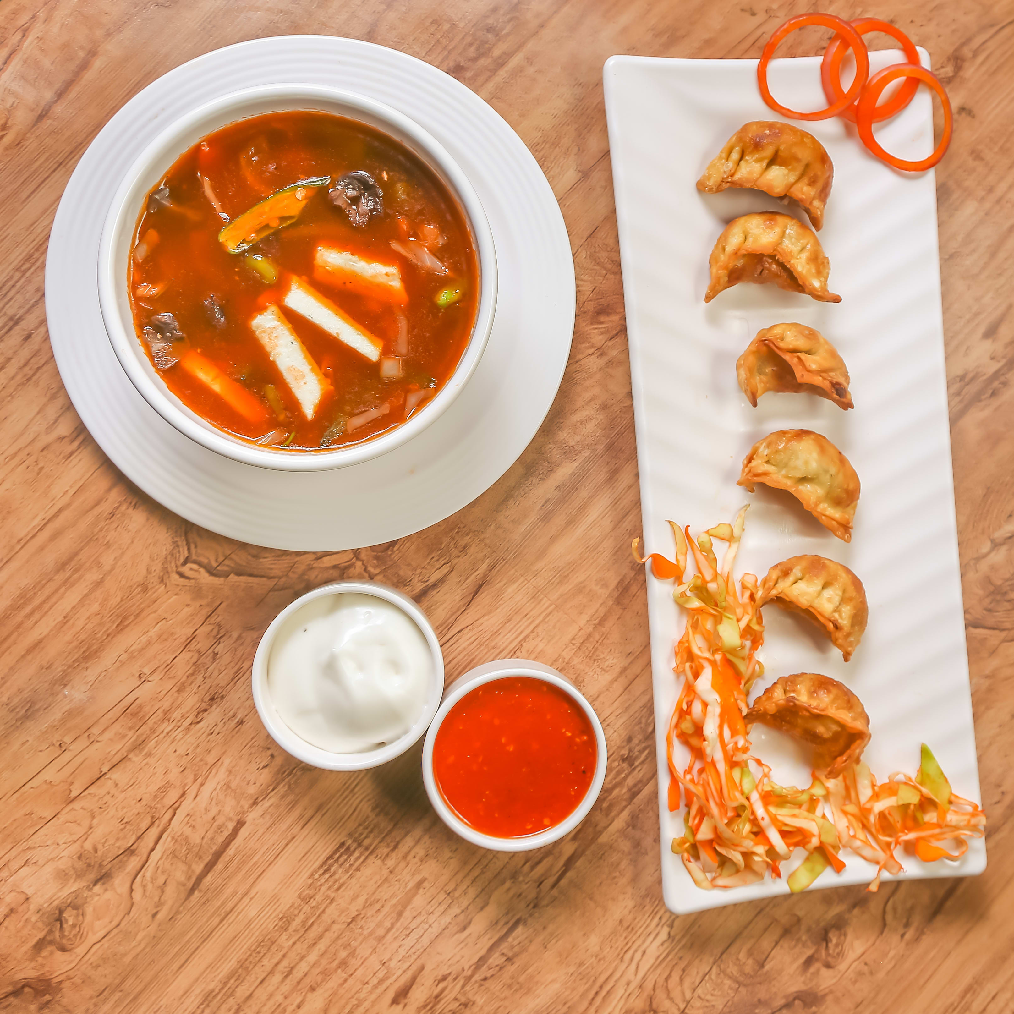 The Hungry Momo Cafe 1090 - Logo