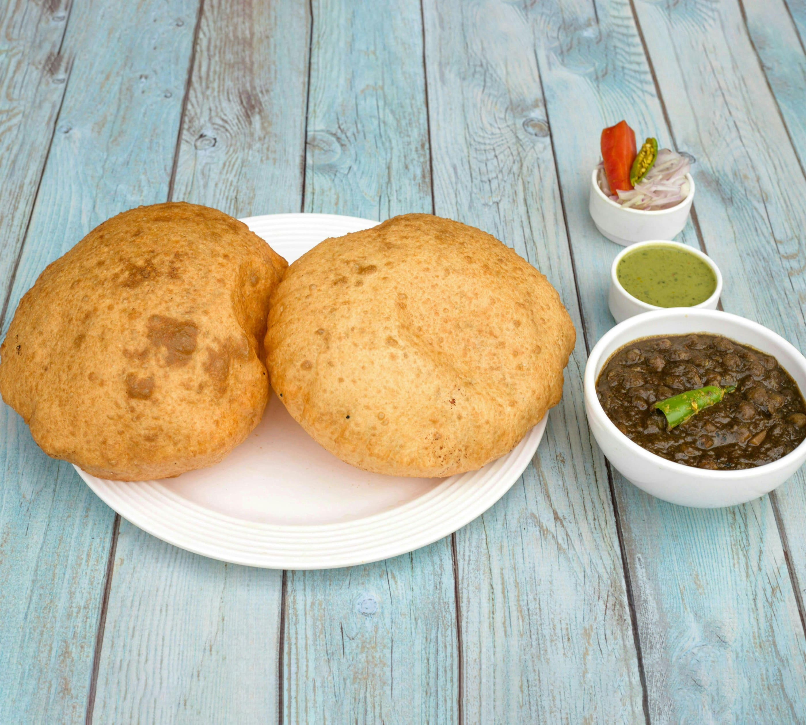 The Last Bhatura ( truly delicious) - Logo