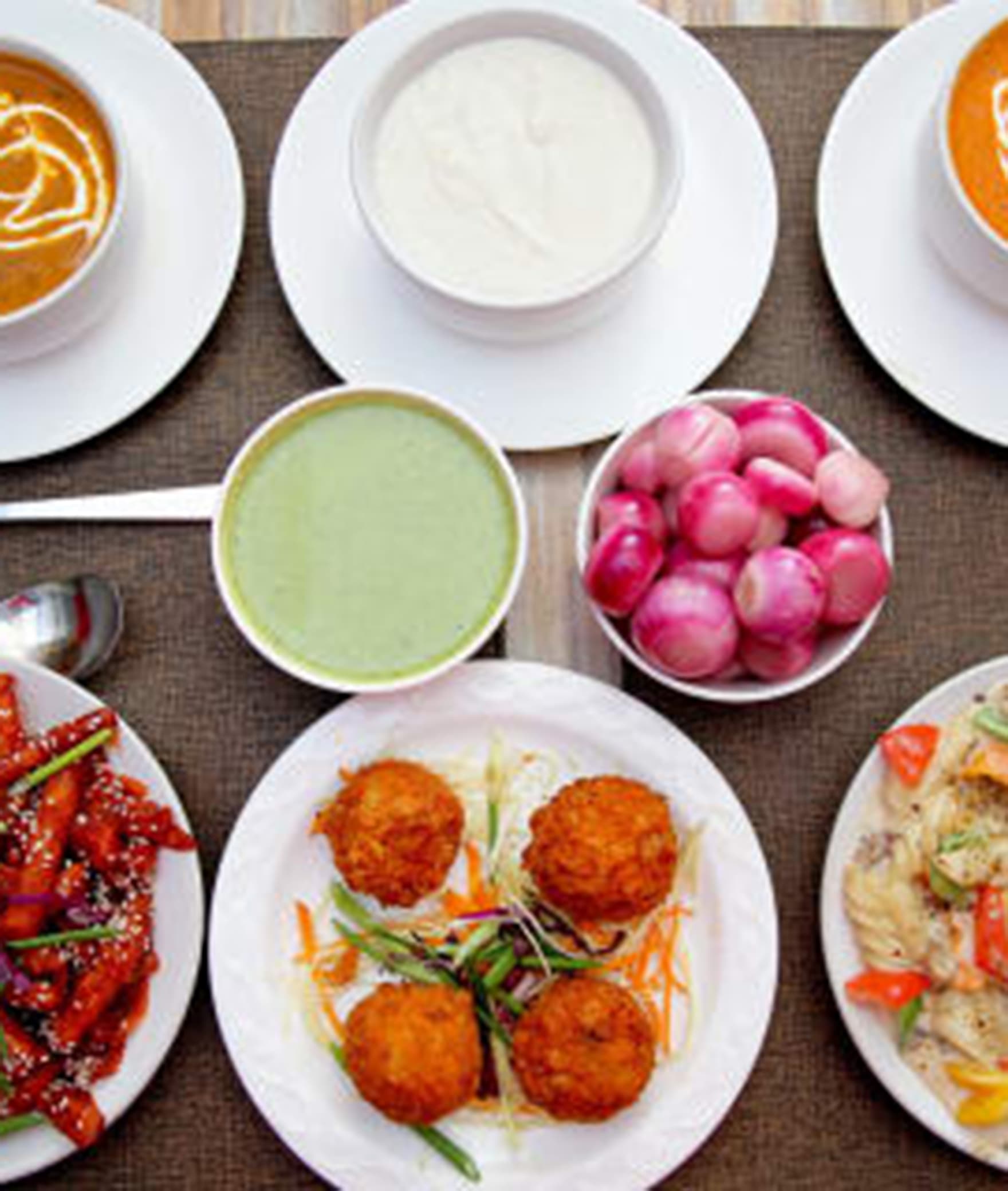 THE RAJ RESTAURANT - Logo