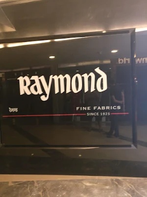 The Raymond Shop - Logo
