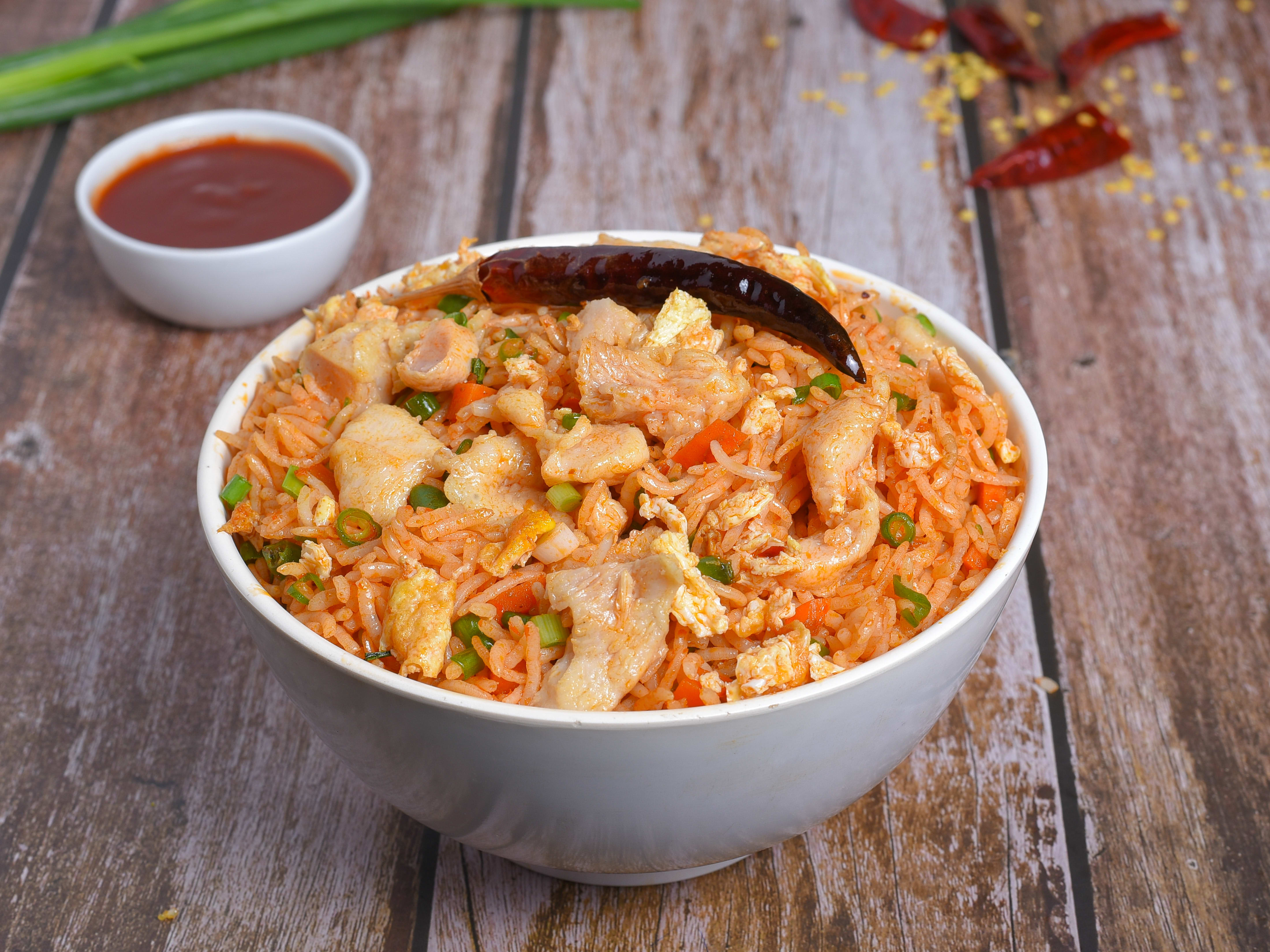 The Rice Bowl Restaurant - Logo