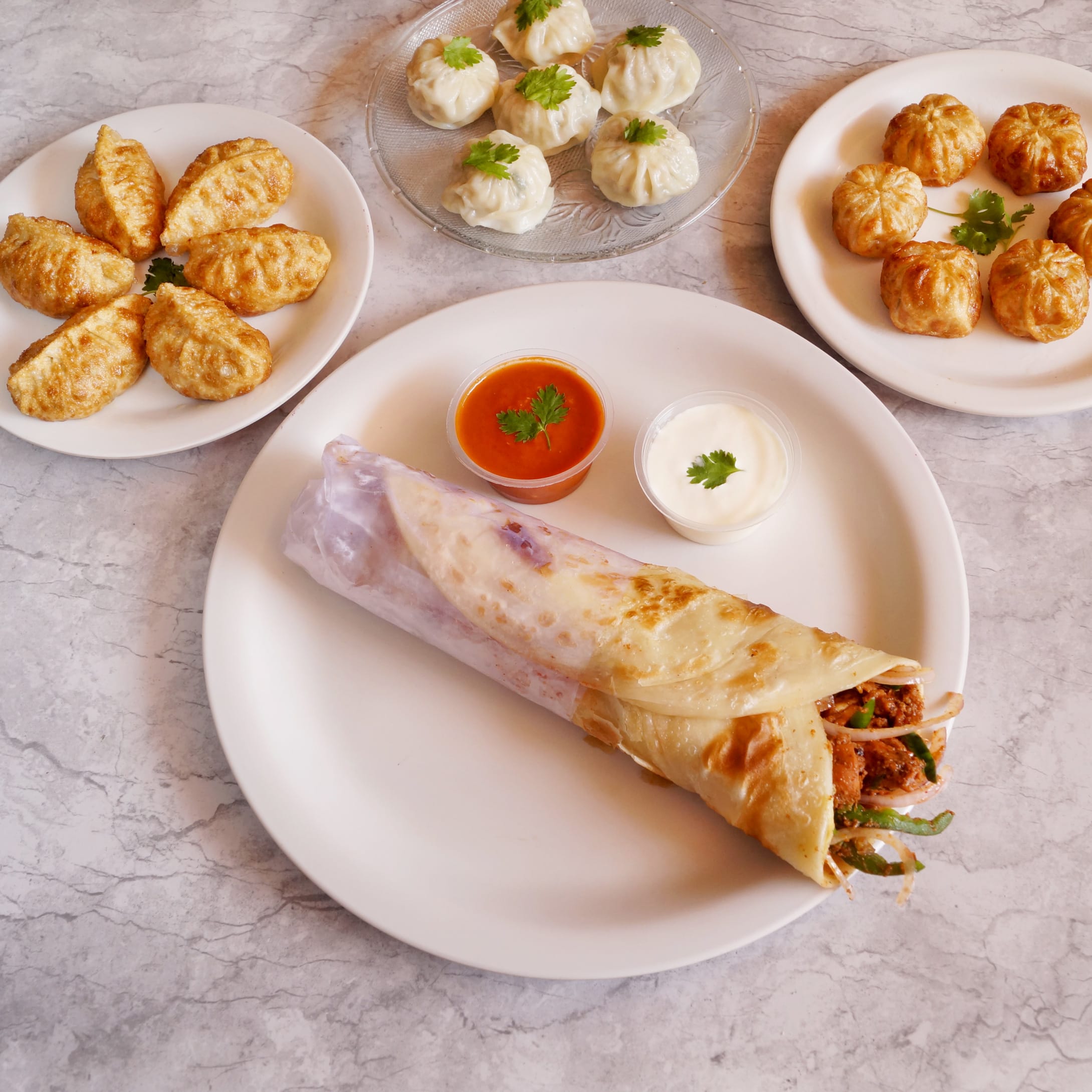 The Roll & Momo's Delicacy - Hyderabad - Logo