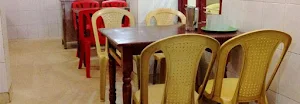 Thottathil Restaurant - Logo