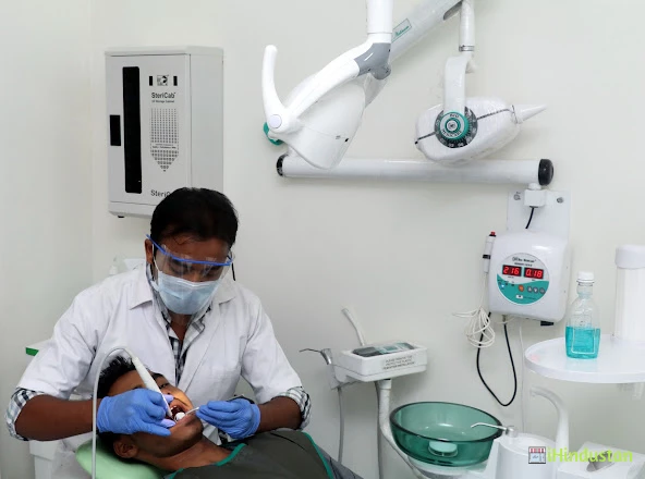 TOOTH + GUMS Multispeciality Dental Clinic And Implant - Logo