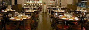 Trattoria, Vivanta By Taj President - Logo