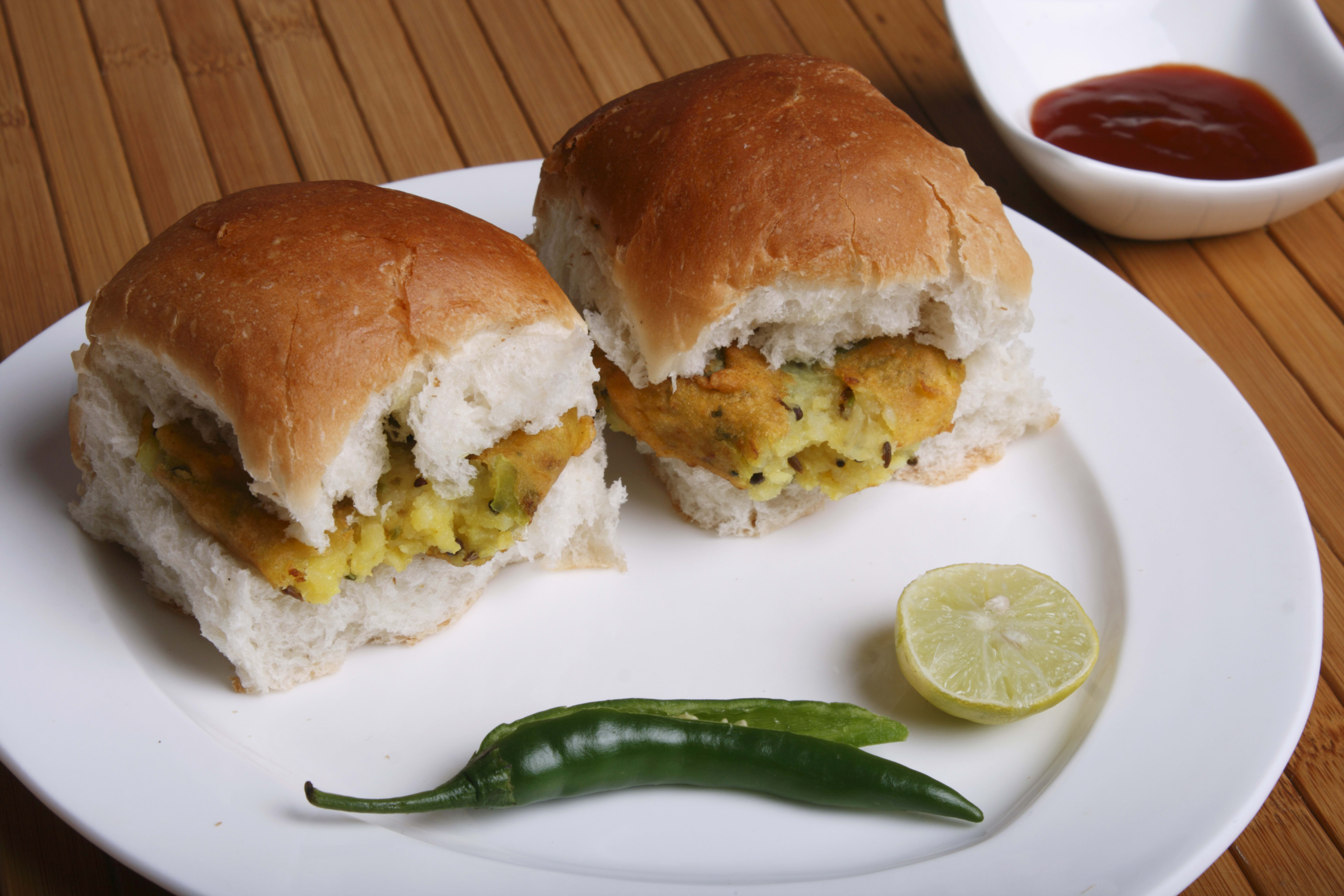 Treat Maruti Pav Bhaji and Sandwich center - Logo