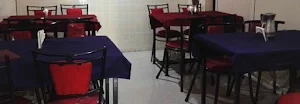 Trilok Restaurant - Logo