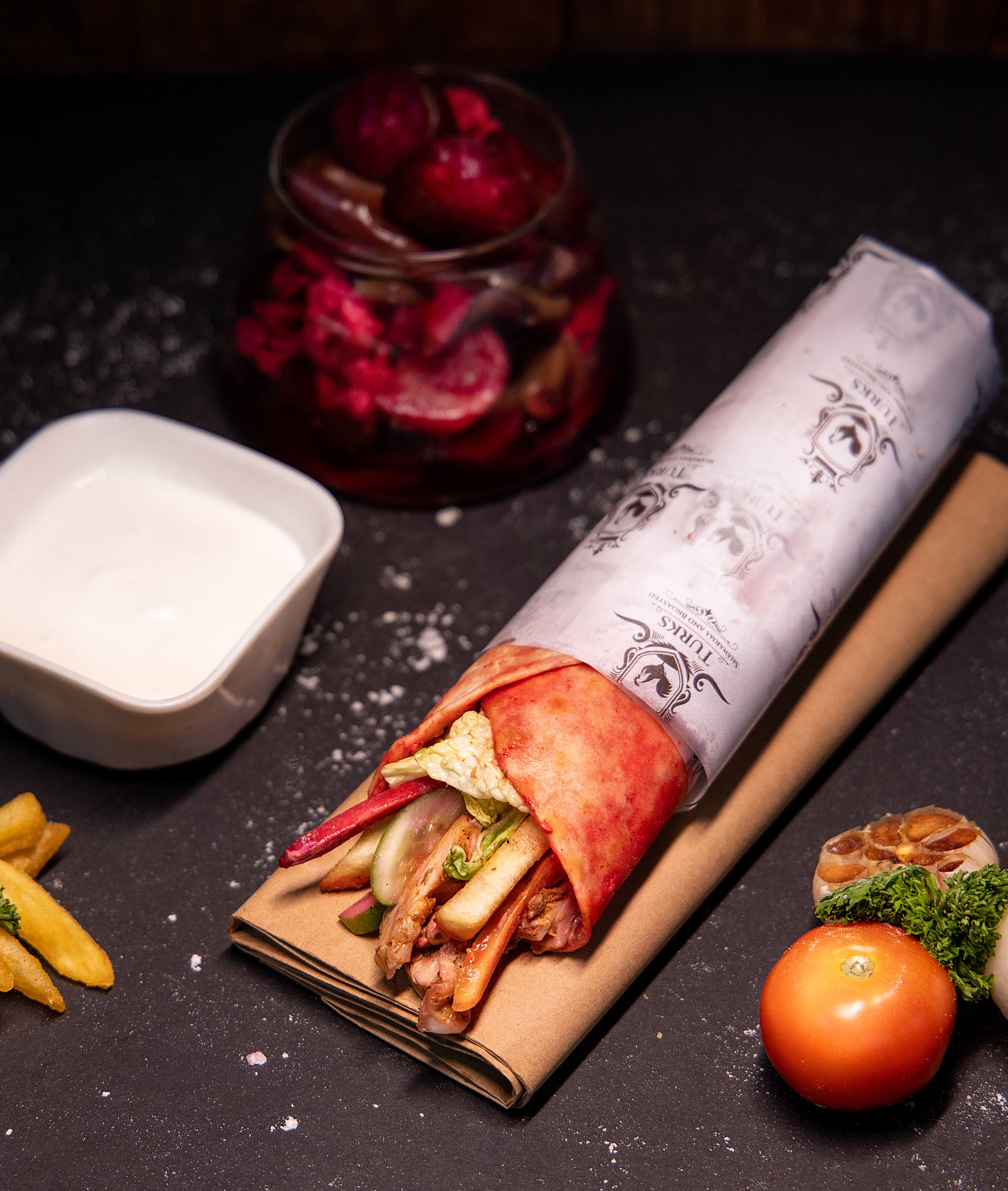 TURKS SHAWARMA AND BROASTED - Logo