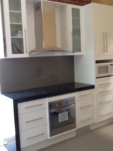United Kitchens and Joinery - Logo