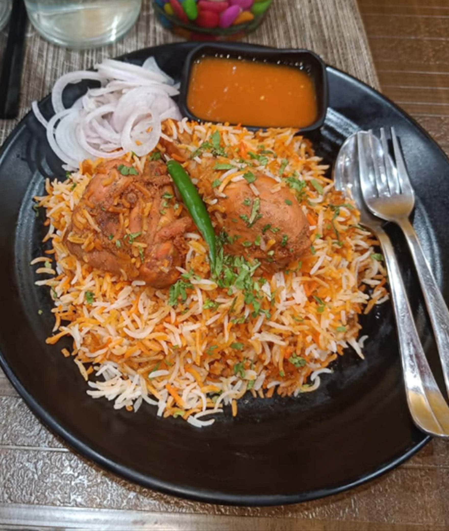 Usha Biryani And Curry Restaurant - Logo