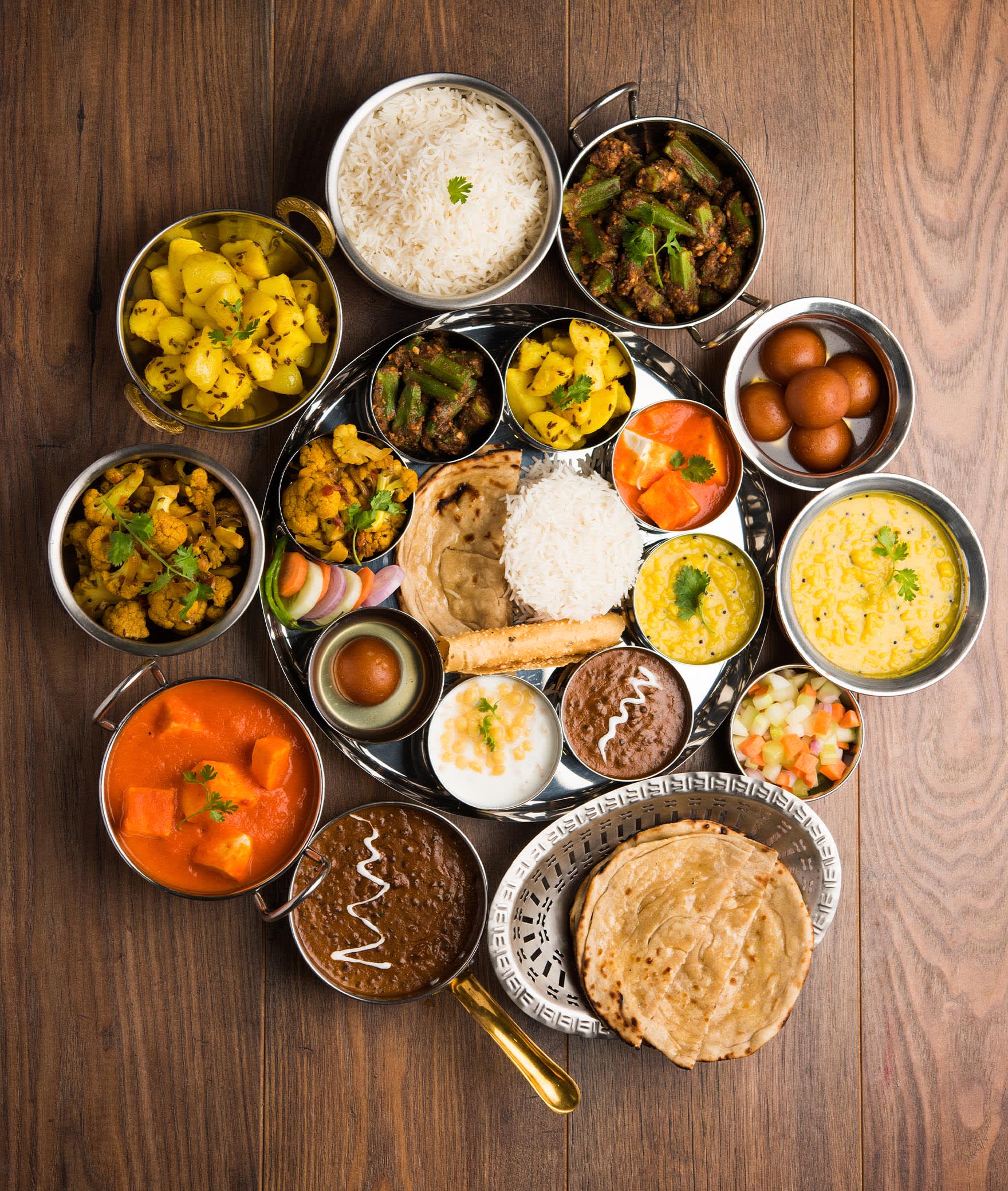 Uttam Sweets Bakery & Restaurant - Logo