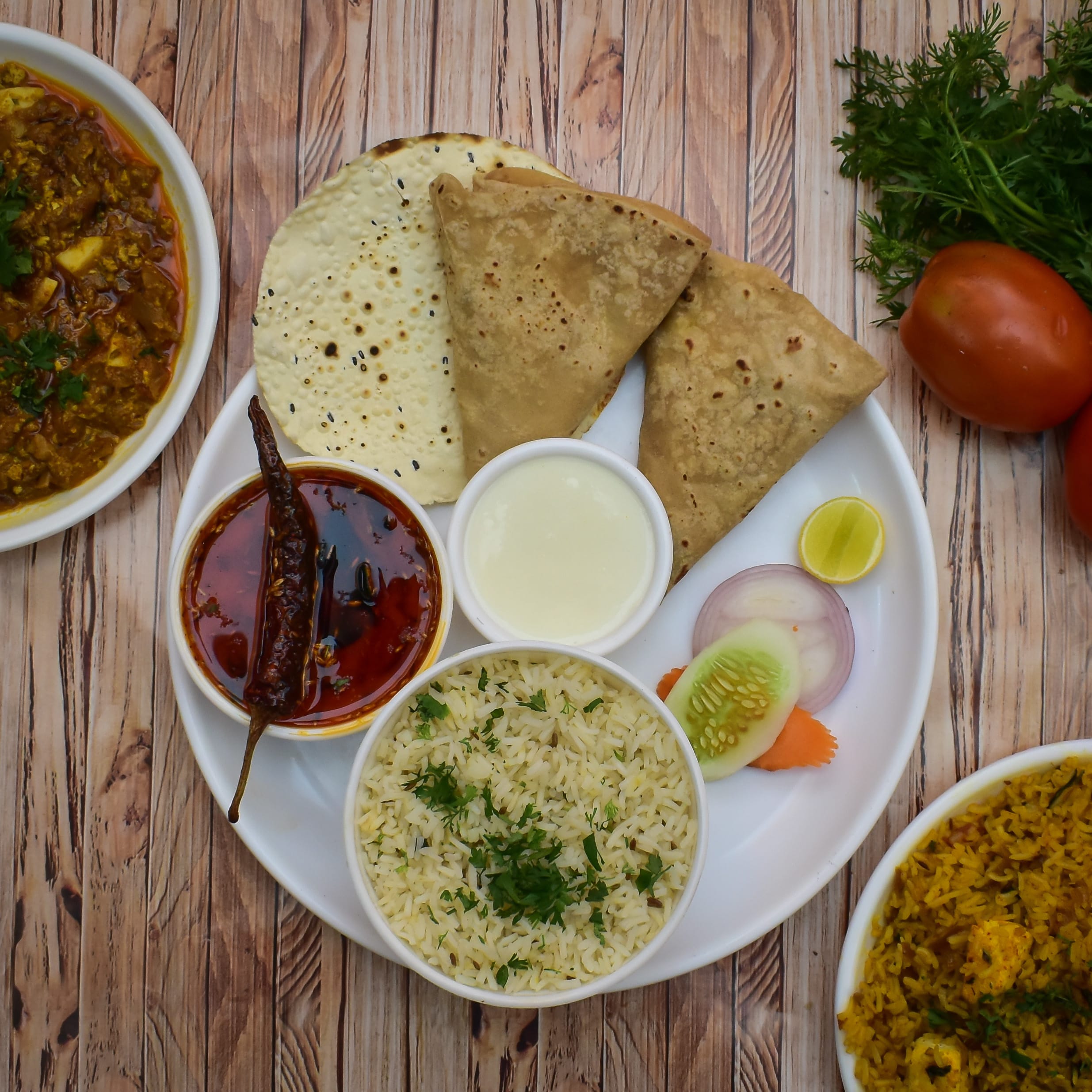 Vakratunda Restaurant - Logo