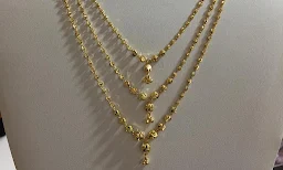 Vardhaman Jewellers - Logo