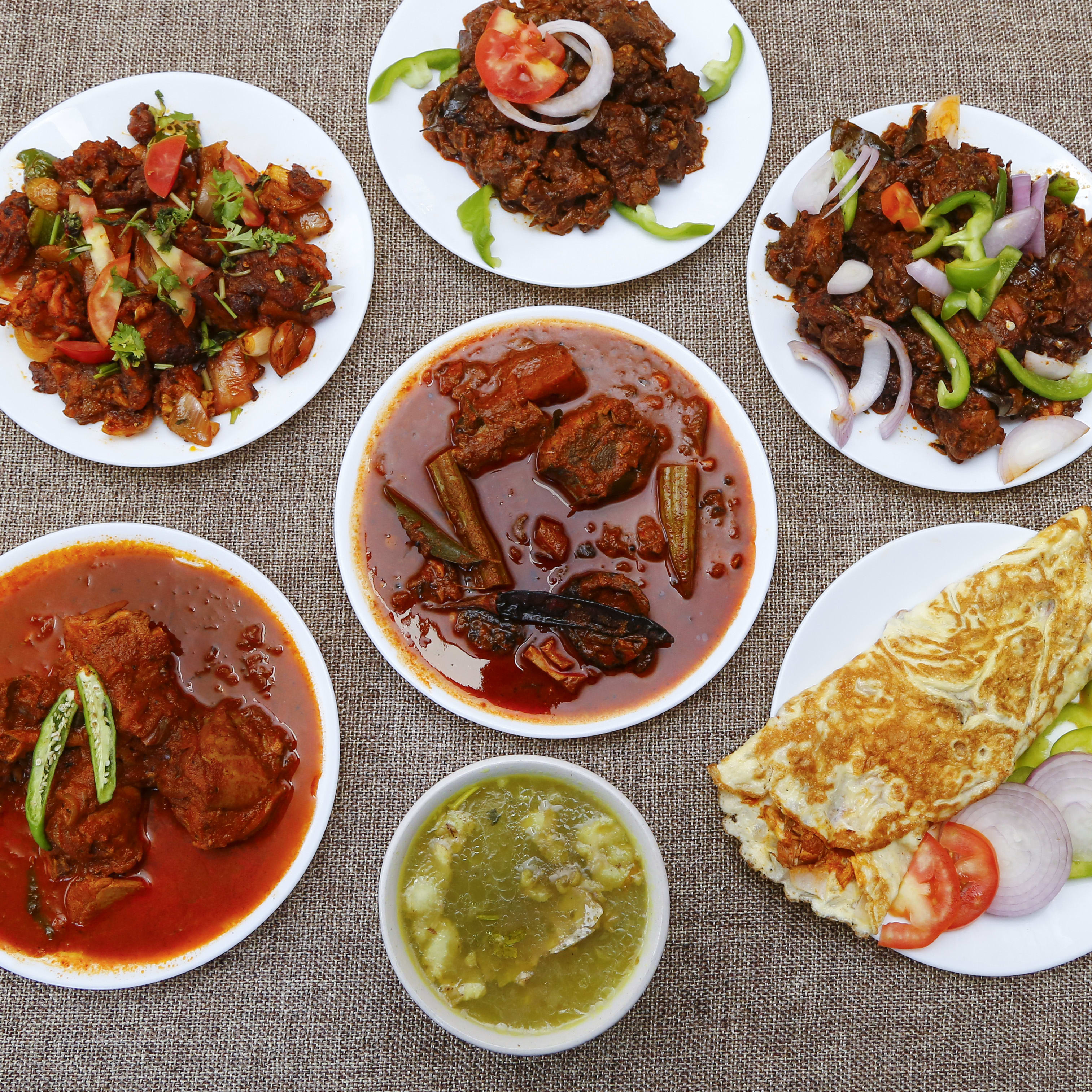 Vazhathoppil Family Restaurant - Logo