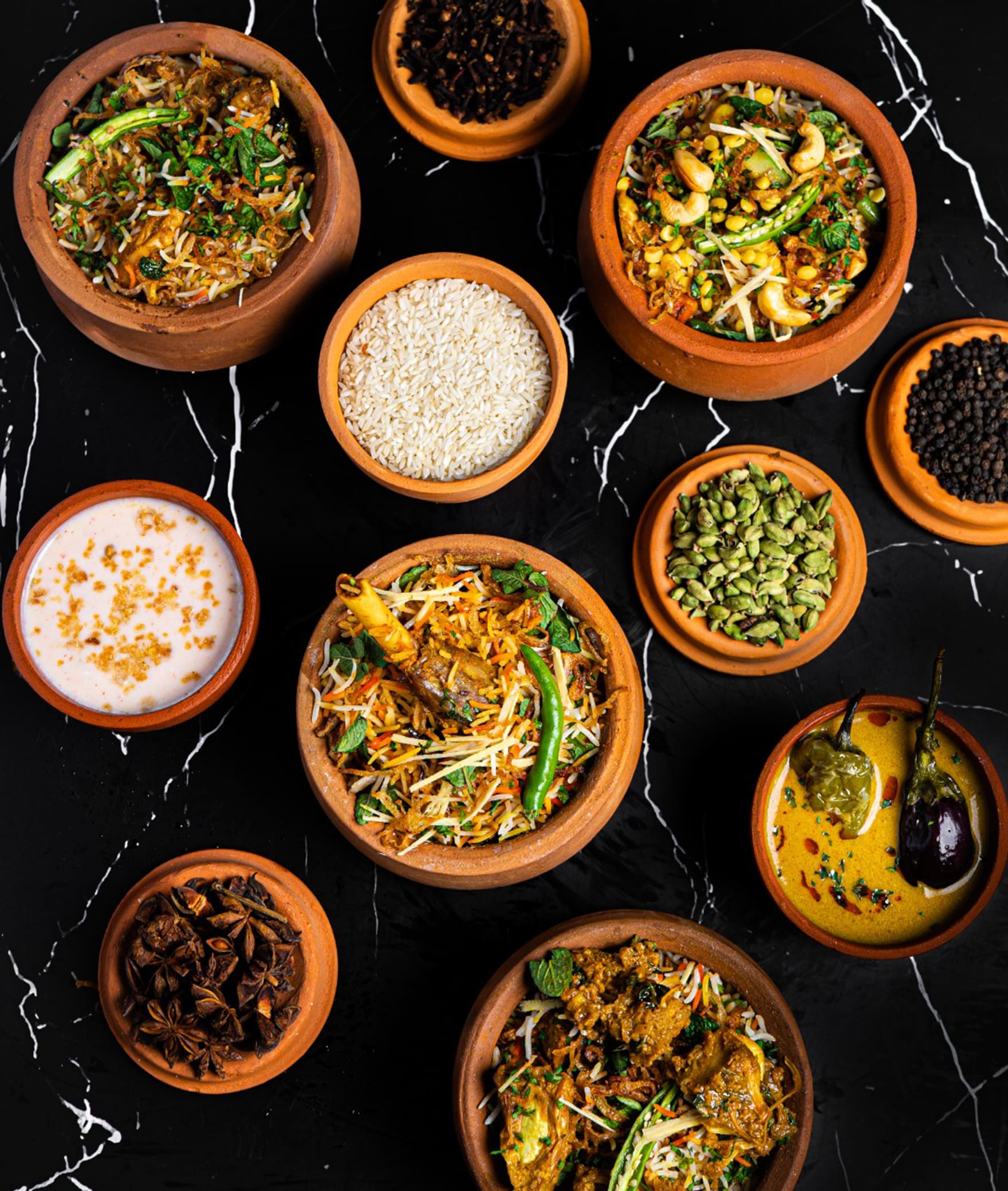 Vdeliver - Exquisite Multicuisine Kitchen - Logo