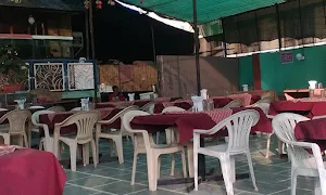 Vedanti Family Garden Restaurant - Logo