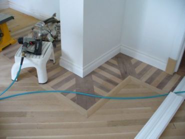 Village Hardwood Flooring Inc - Logo