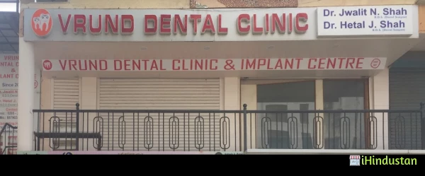 Vrund Dental Clinic And Implant Centre - Logo