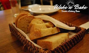 Wake N Bake Snacks N Bakery - Logo