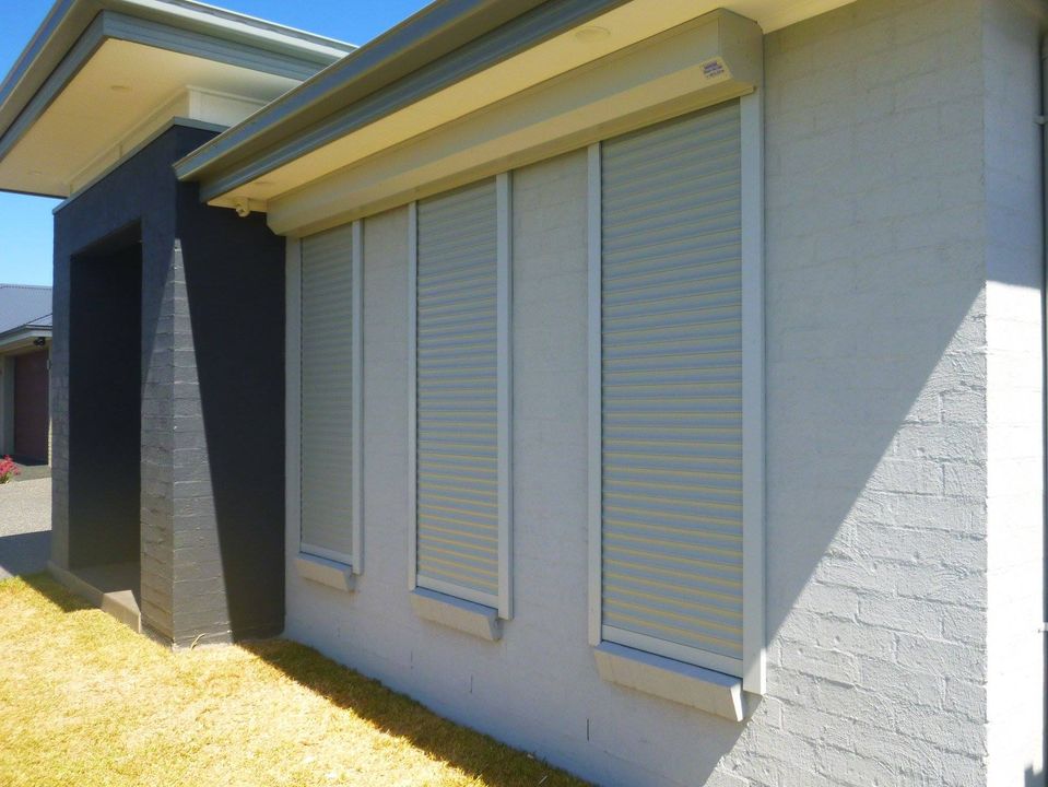 Wollongong Roller Shutters Pty Ltd - Logo