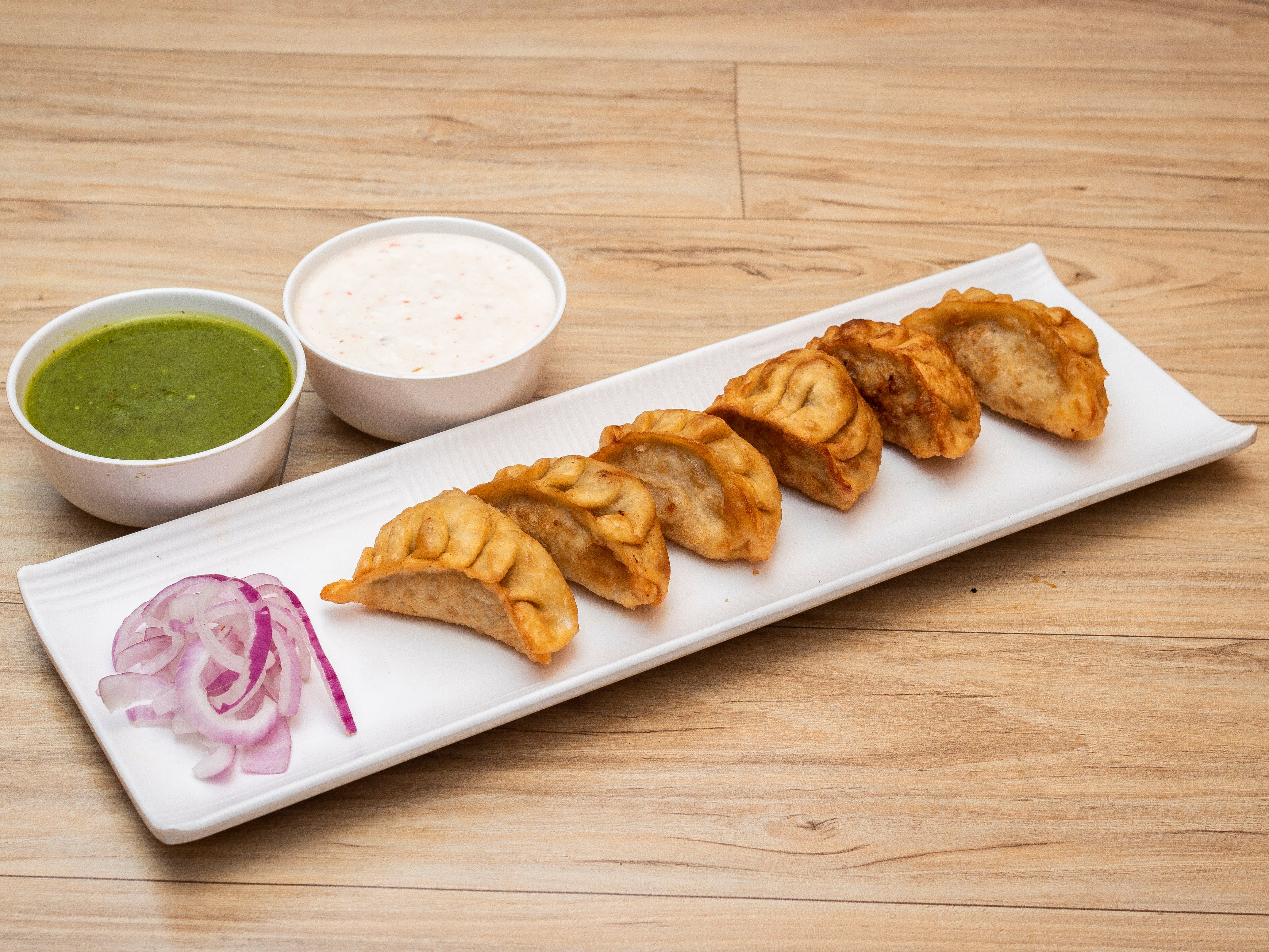 Wonton Momos - Logo