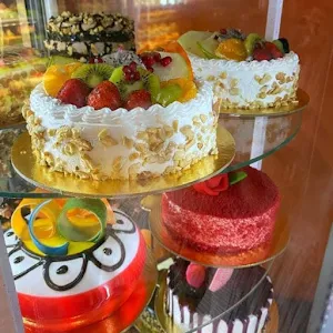 World Of Cakes - Logo