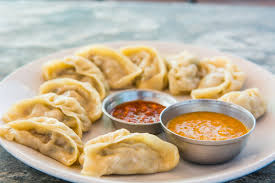 Wow 2 Momos - Logo