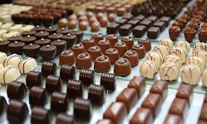 Wow Homemade Chocolates & Ooty Chocolates - Logo