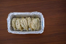 Yama Tibetian Momo Cafe - Logo