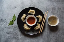 Yummy Momos - Cover photo