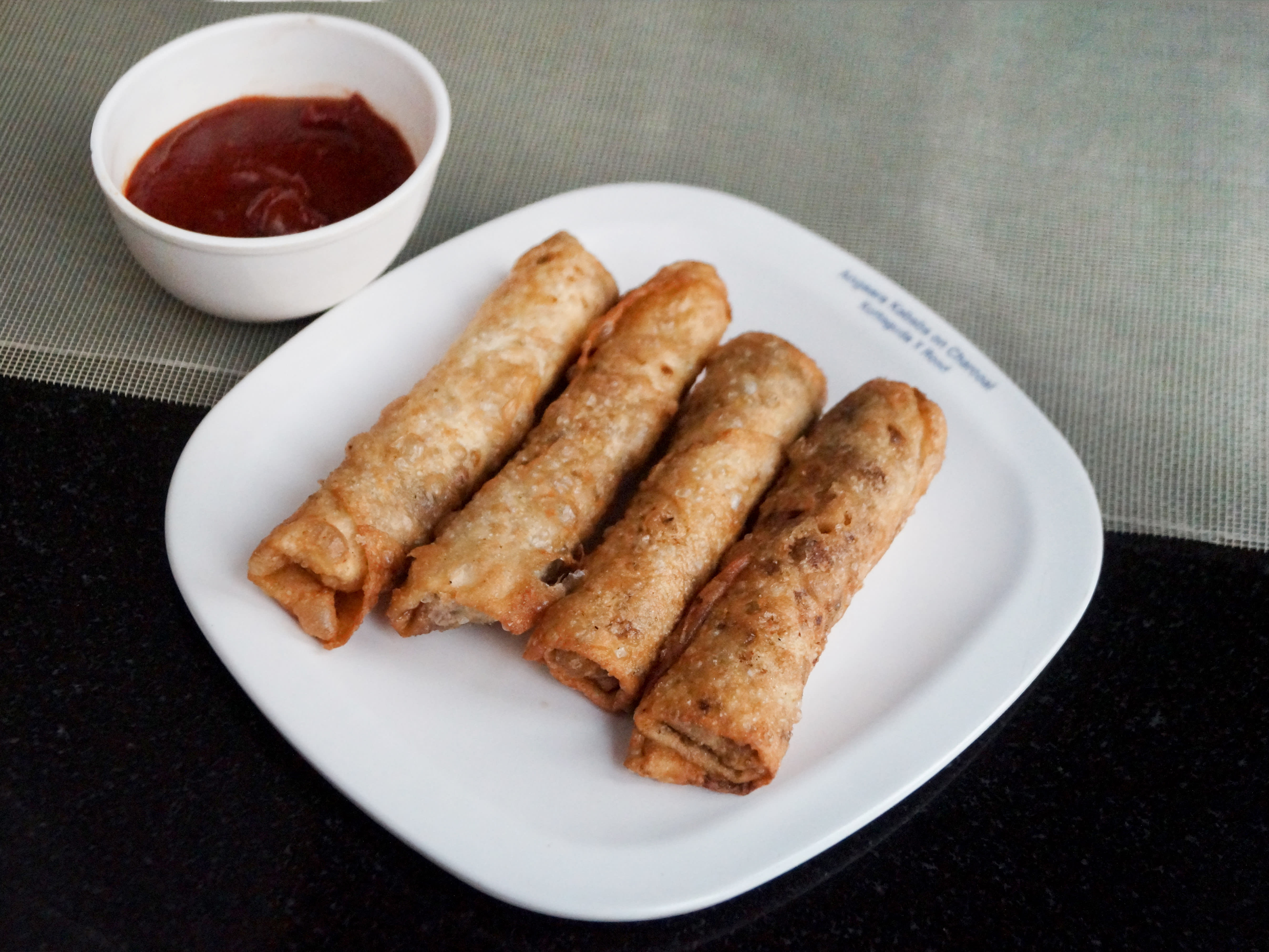 Yummy Rolls...Mad Momos - Logo