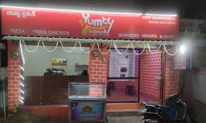 Yumty Stomack - Logo