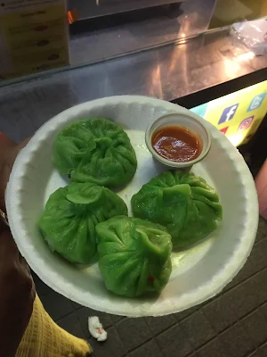 Zomoz - Specialty Momos - Logo