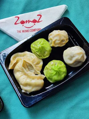 Zomoz - The Momo Company - Logo