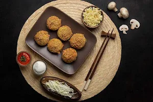 Zomoz - The Momo Company - Cover photo